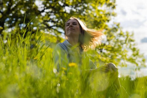 Happy woman enjoying nature