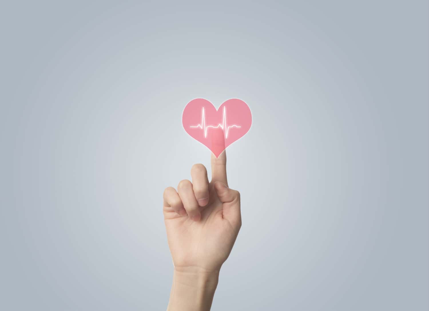 Finger touching a hand drawn heart