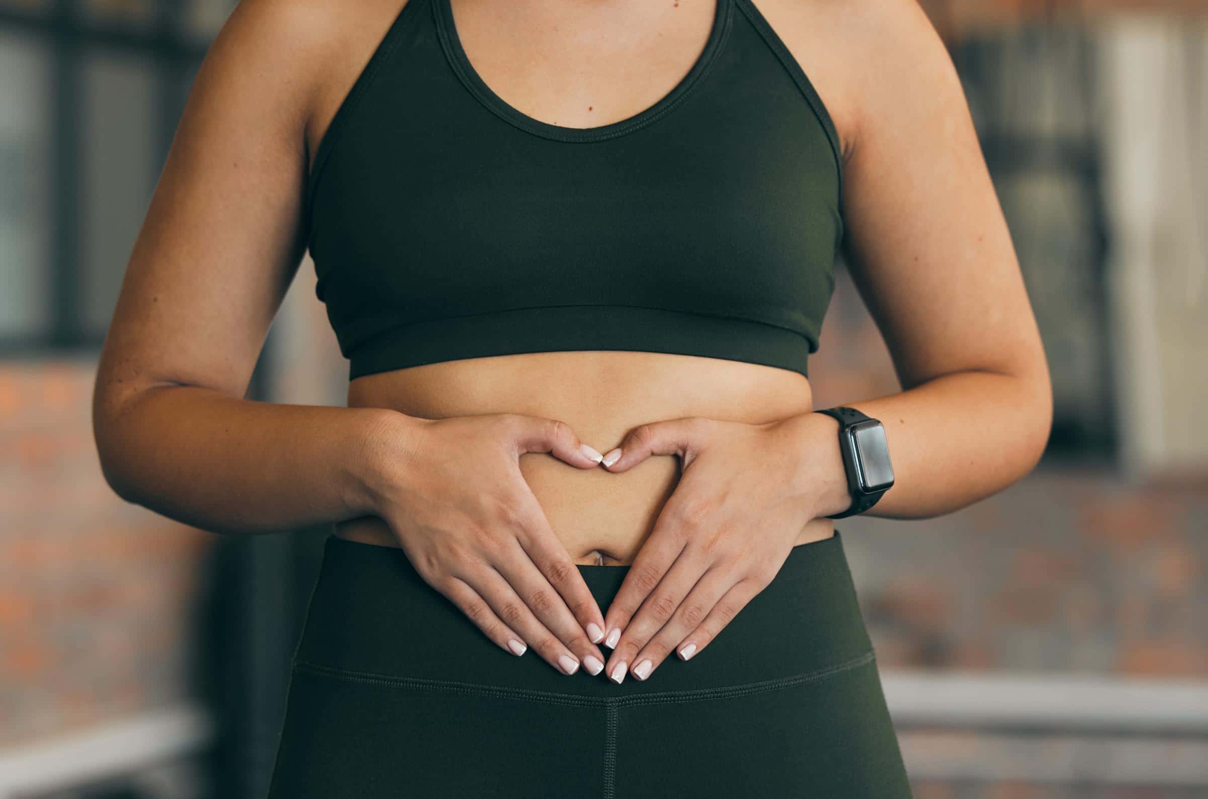 Woman with her hands on her belly