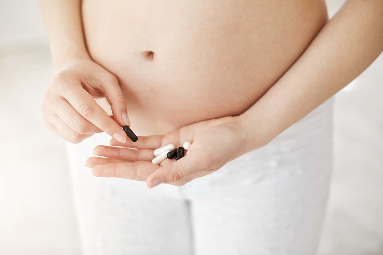 Woman taking pills